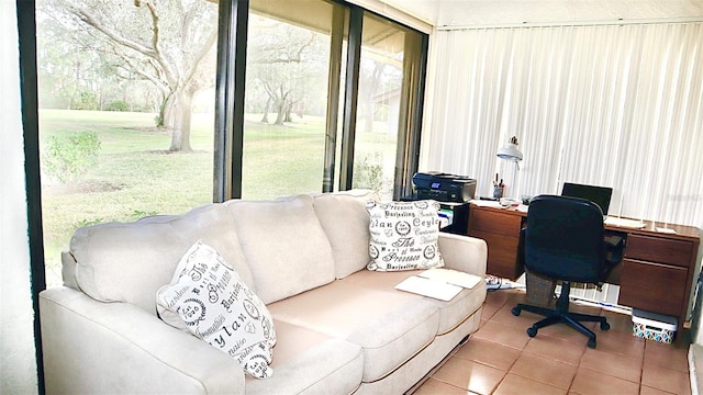 office space featuring tile patterned floors and a wealth of natural light