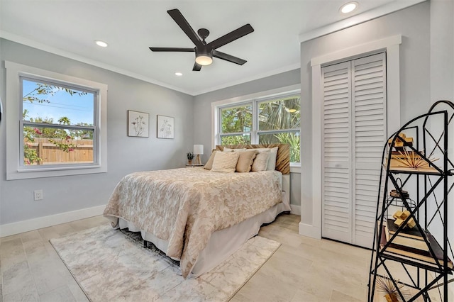 bedroom featuring recessed lighting, a closet, baseboards, ornamental molding, and ceiling fan