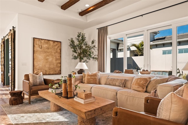 living room with recessed lighting, beam ceiling, and wood finished floors