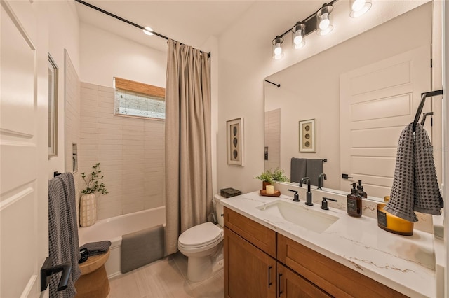 bathroom featuring toilet, tile patterned flooring, shower / bath combo with shower curtain, and vanity