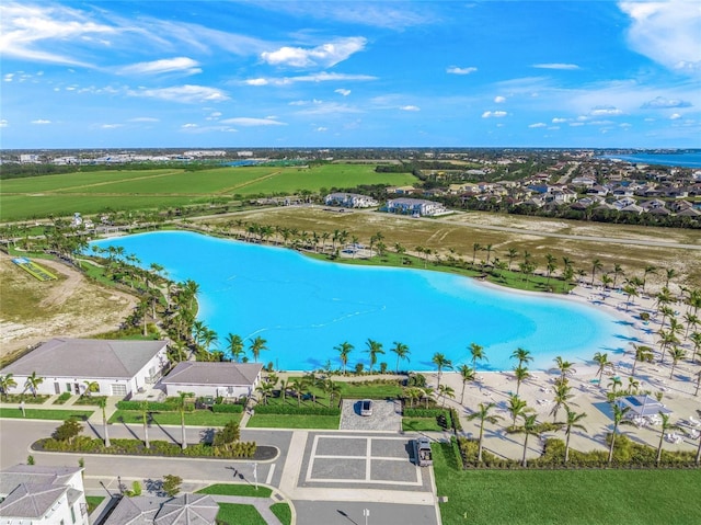 aerial view with a residential view and a water view