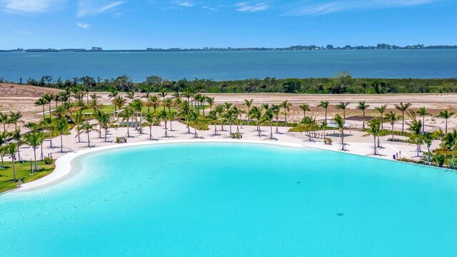 community pool with a water view