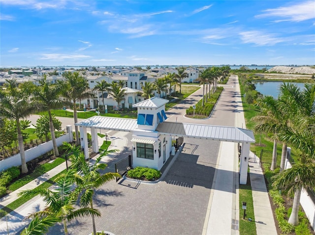 aerial view featuring a residential view and a water view