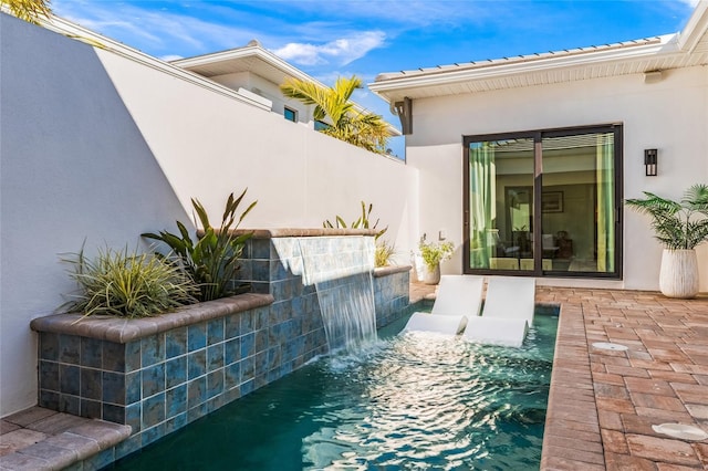 exterior space with a patio area and fence