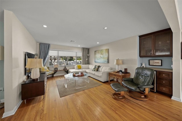 living room featuring light hardwood / wood-style flooring