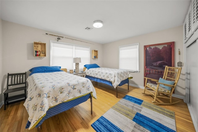 bedroom featuring hardwood / wood-style floors