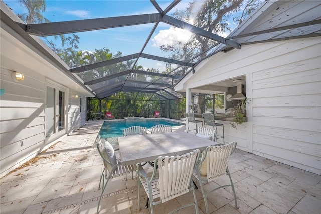 view of patio / terrace with a lanai