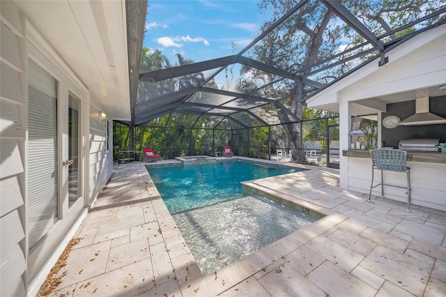 view of pool featuring an in ground hot tub, a grill, glass enclosure, and a patio area