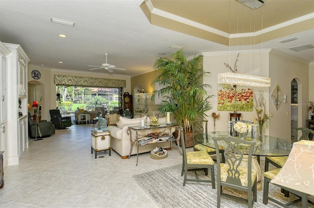 interior space with crown molding and ceiling fan