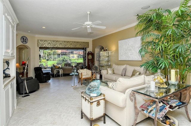 living room featuring ornamental molding, light tile patterned floors, and ceiling fan