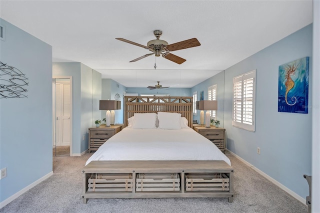 carpeted bedroom featuring ceiling fan