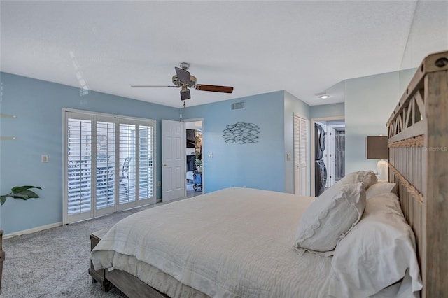 carpeted bedroom featuring a textured ceiling and ceiling fan