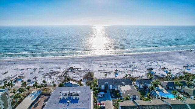 bird's eye view with a water view and a view of the beach