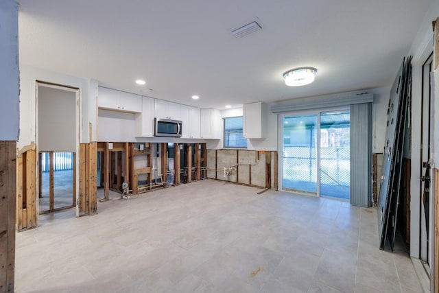 interior space with visible vents and recessed lighting