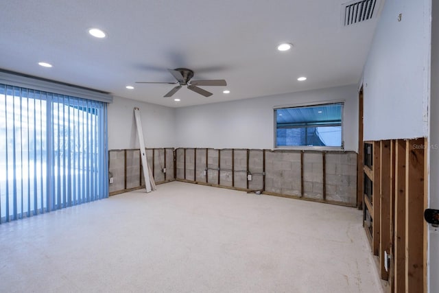 unfurnished room with visible vents, a ceiling fan, and recessed lighting