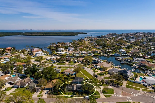 aerial view featuring a water view and a residential view