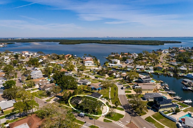 aerial view featuring a water view and a residential view