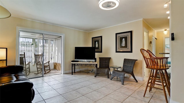 tiled living room featuring ornamental molding