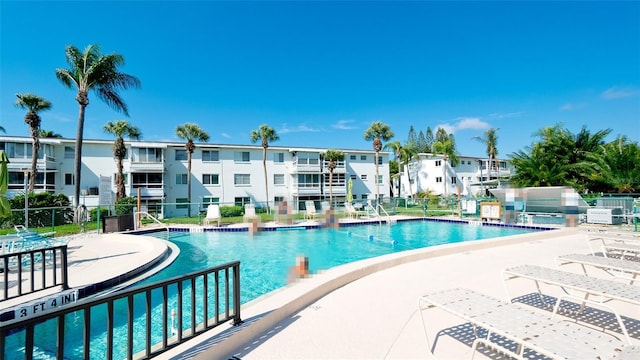 view of swimming pool with a patio area