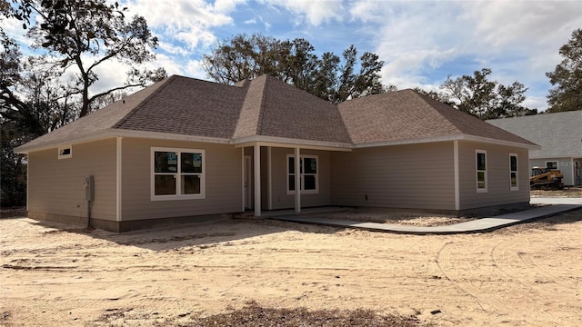 rear view of property featuring a patio area