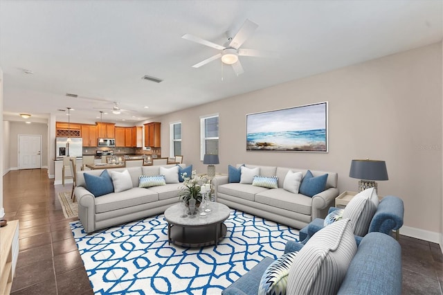 living room with ceiling fan