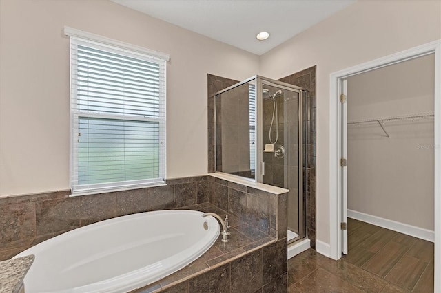 bathroom with independent shower and bath