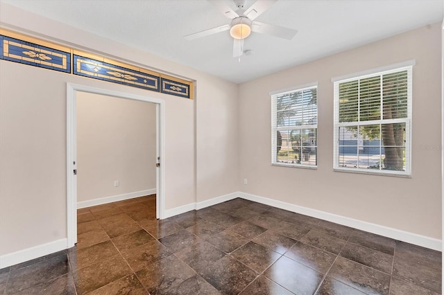 empty room featuring ceiling fan