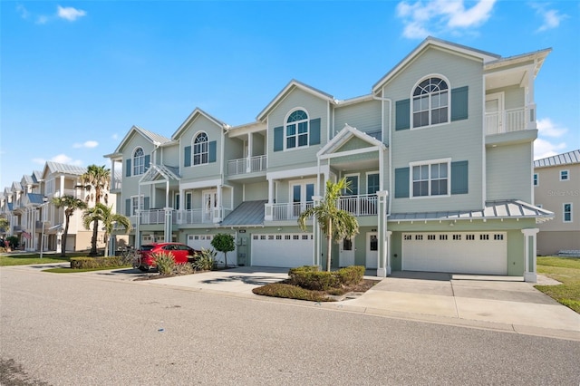 townhome / multi-family property featuring a garage