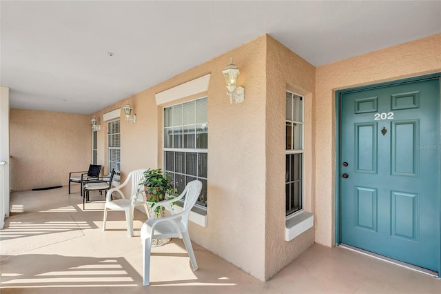 entrance to property with covered porch