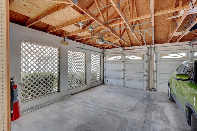 garage featuring a garage door opener