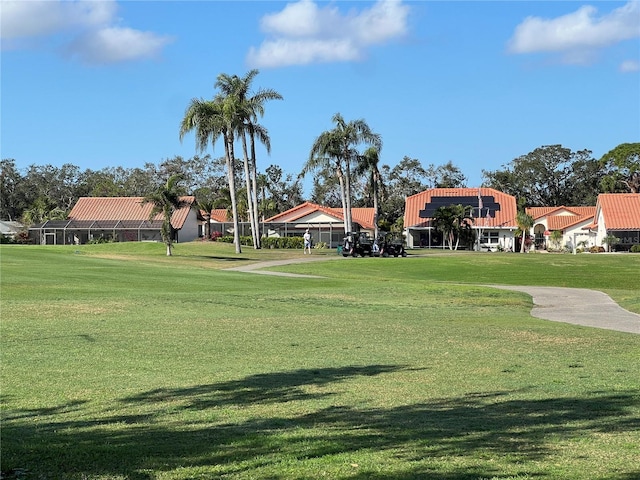 view of community featuring a yard