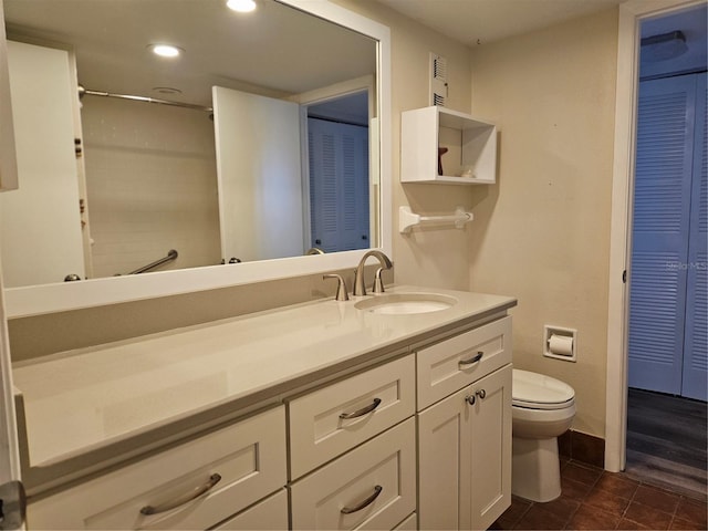 full bathroom with recessed lighting, a closet, toilet, vanity, and tile patterned floors