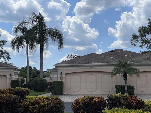 view of side of home with a garage