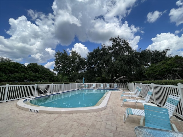 view of pool with a patio