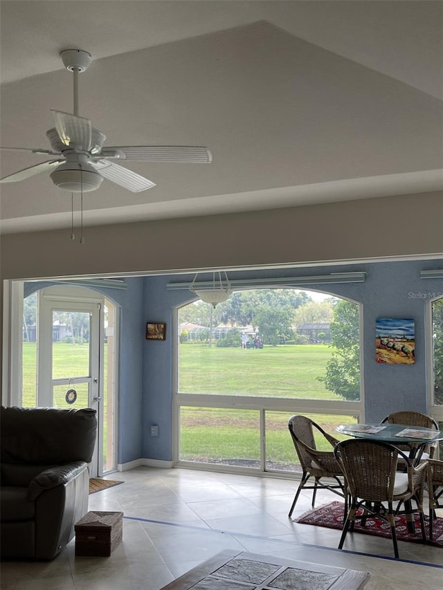 dining room with a wealth of natural light and ceiling fan