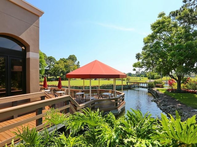 dock area featuring a gazebo and a water view