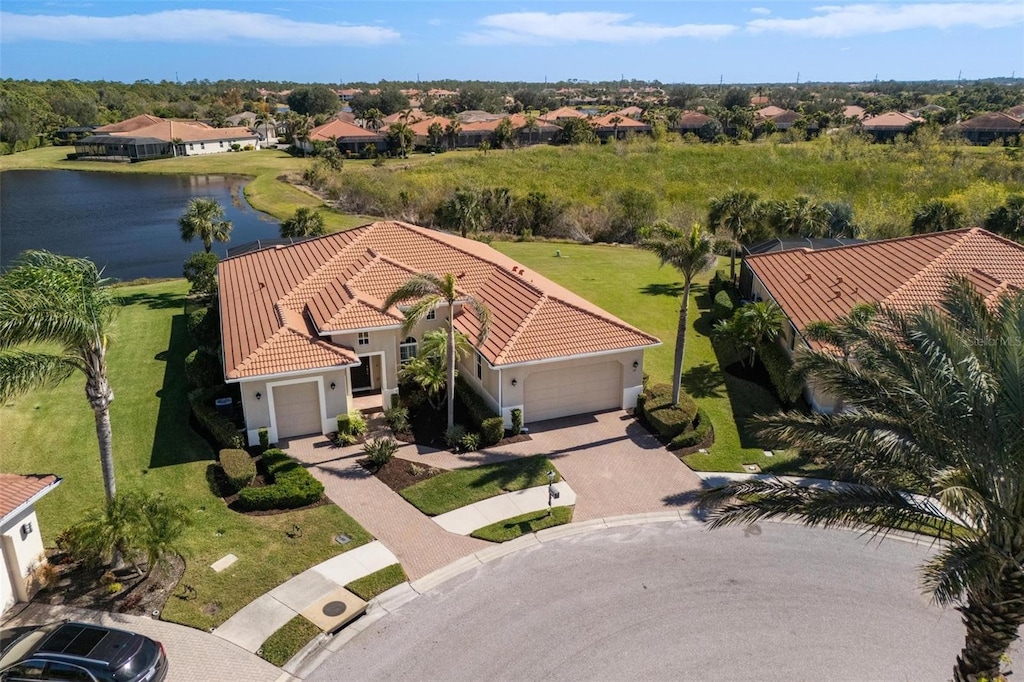 drone / aerial view with a water view