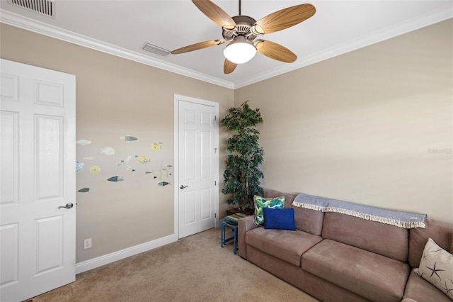 living room featuring ceiling fan, ornamental molding, and light carpet