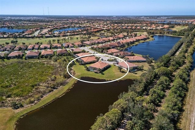 drone / aerial view with a water view