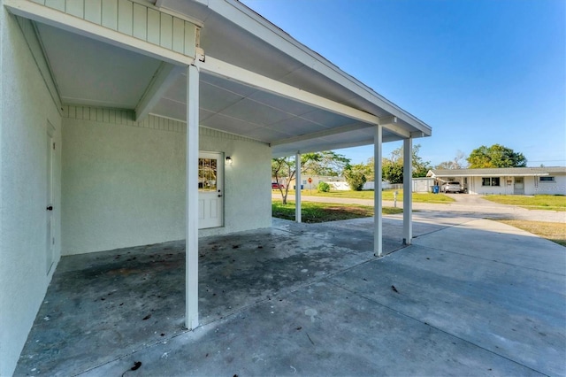 view of patio featuring a carport