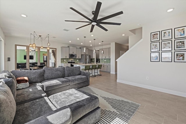 living room with ceiling fan