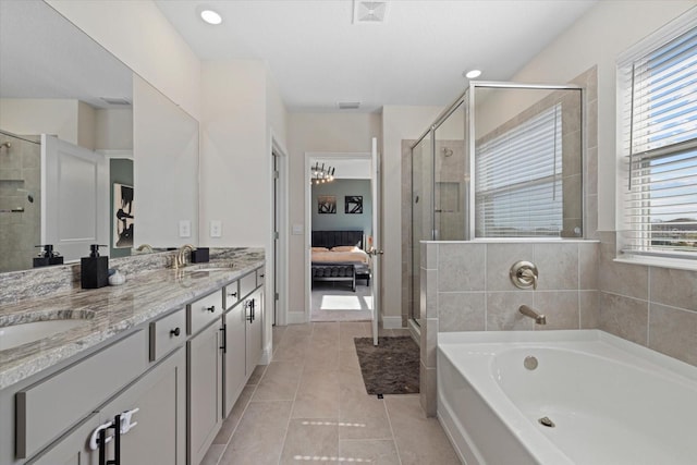 bathroom with vanity, separate shower and tub, and tile patterned floors