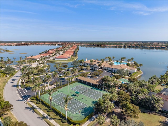 birds eye view of property with a water view