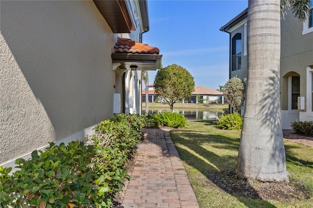 view of yard with a water view