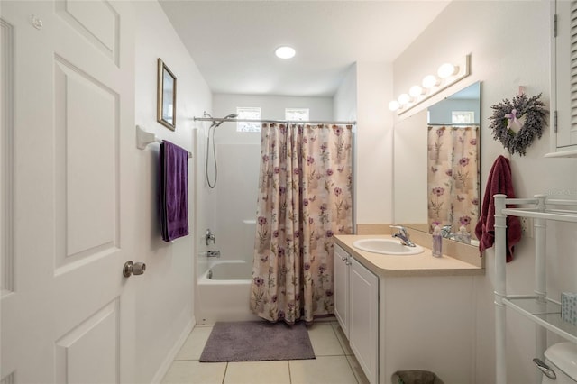 full bathroom featuring shower / tub combo with curtain, vanity, toilet, and tile patterned flooring