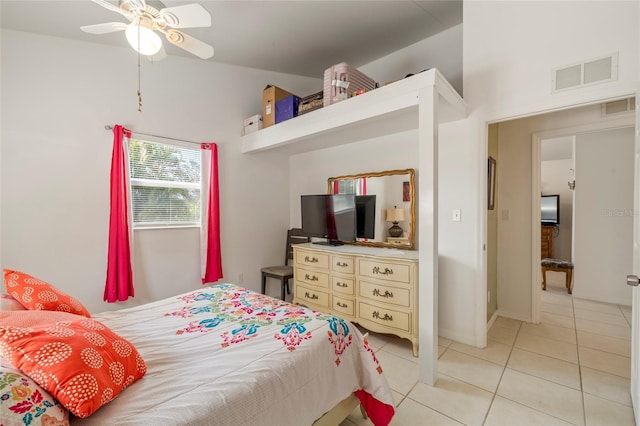 bedroom featuring light tile patterned floors and ceiling fan