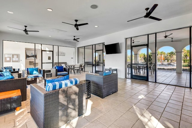 living room with recessed lighting, ceiling fan, and light tile patterned floors