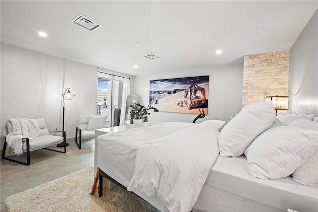 bedroom featuring recessed lighting, visible vents, and finished concrete floors