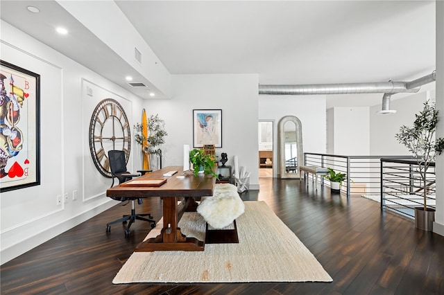 home office with recessed lighting, dark wood-style flooring, and visible vents