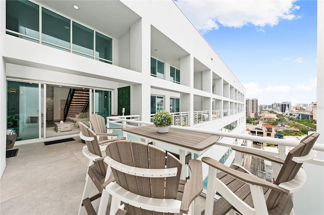 balcony featuring a view of city